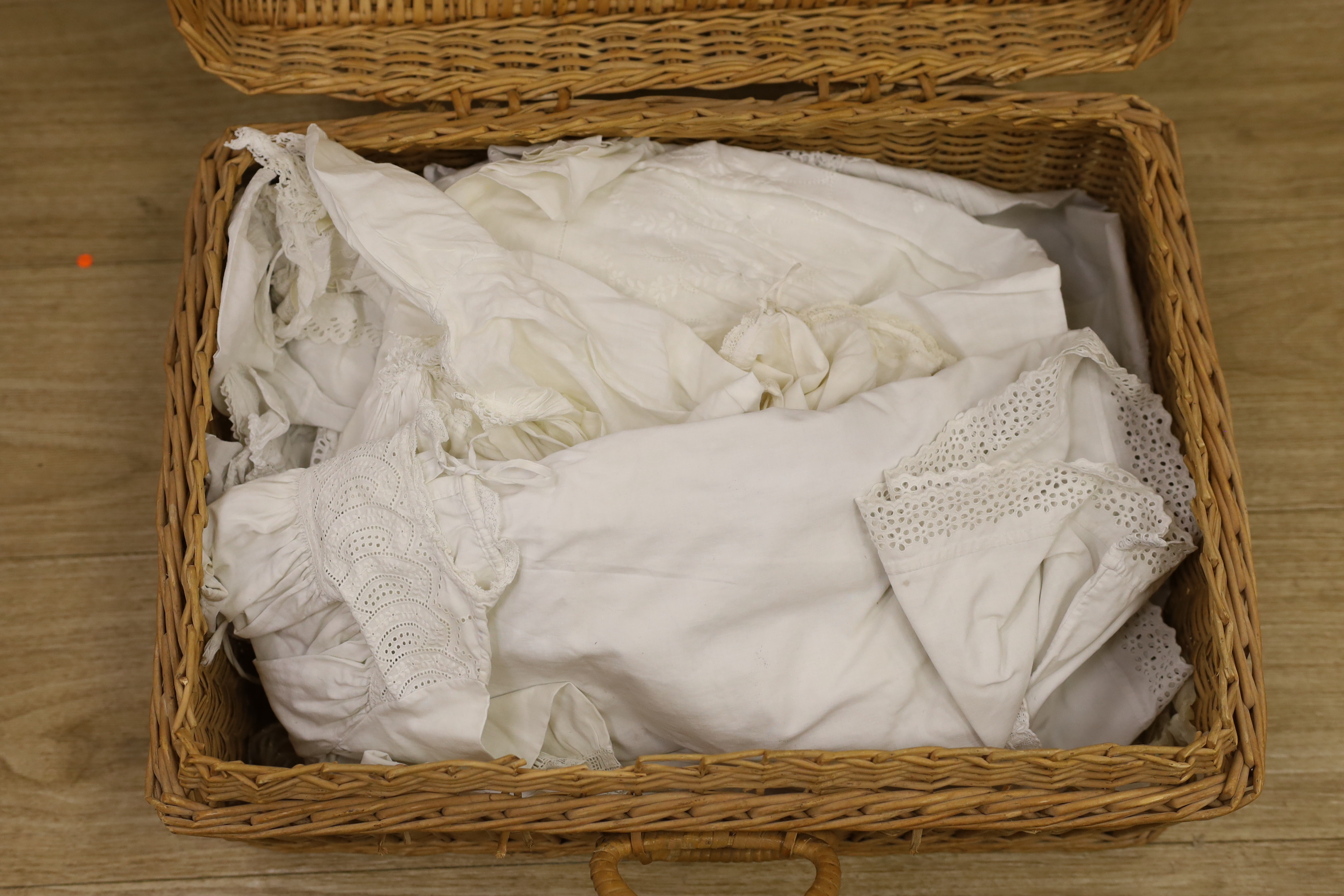 Five 19th century white worked and embroidery anglaise christening gowns, six similar baby dresses a cream wool silk embroidered shawl and a knitted shawl etc